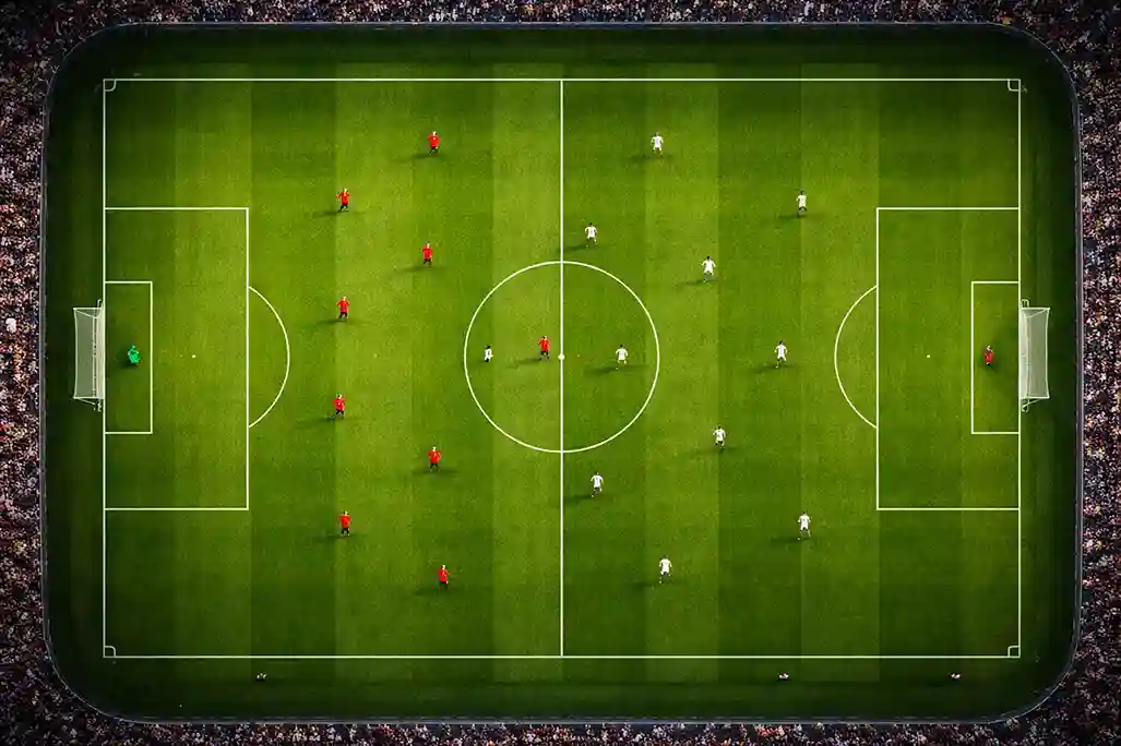 Vue aérienne d'un terrain de football avec lignes tactiques visibles